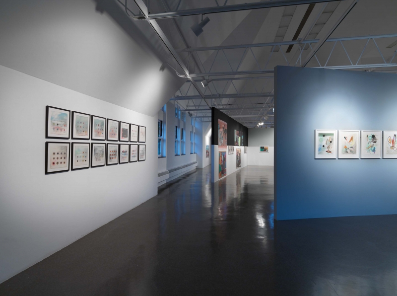 Color prints and mixed-media works on view in the gallery